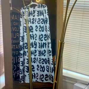 Black and white cape .